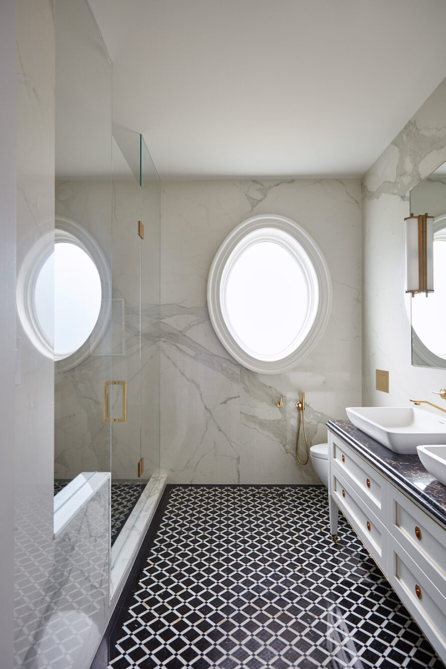 marble-walls-black-and-white-tile-flooring-bathroom