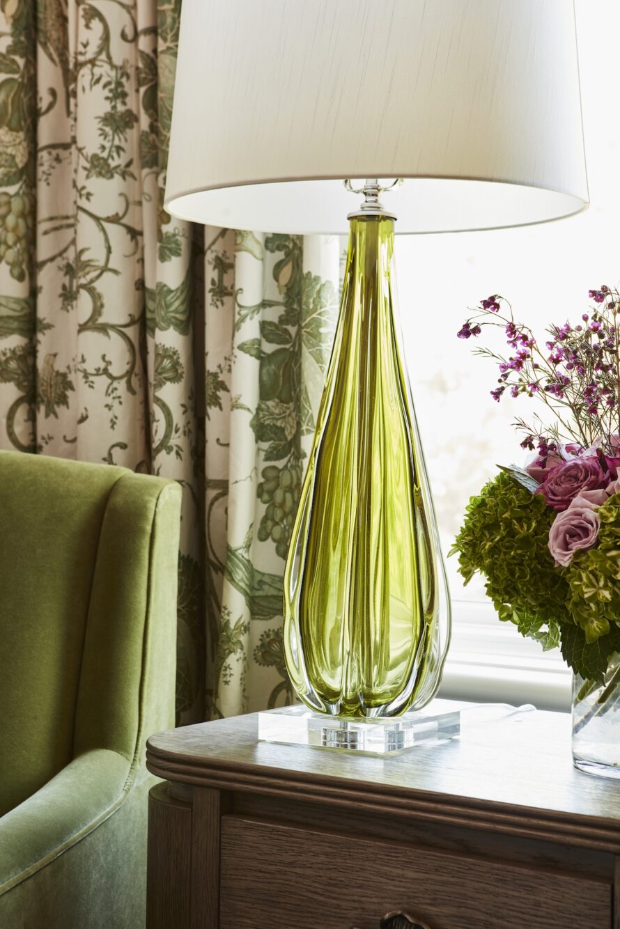 green-glass-lamp-on-table